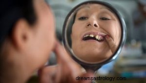 Vad betyder det att drömma om en tänder som faller ut eller lossnar? 