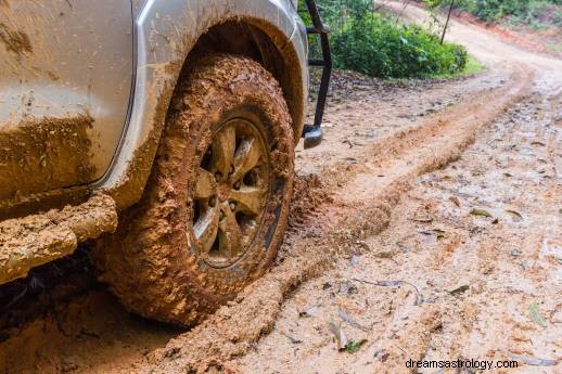 Droom over auto die vast komt te zitten in modder Betekenis