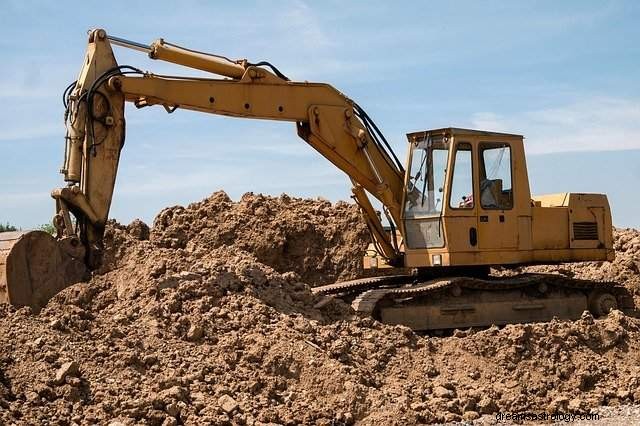 For at drømme om en bulldozer eller gravemaskine, graver