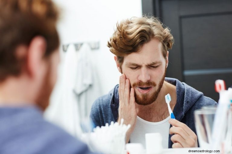 Kiespijn – Betekenis en symboliek van dromen