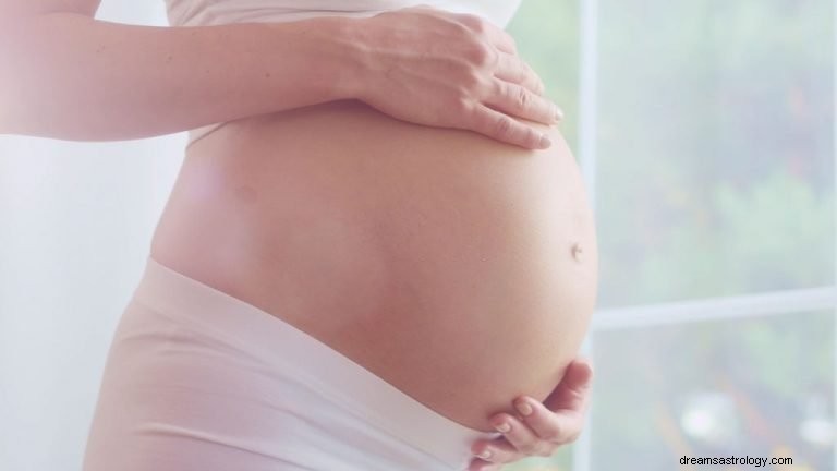 Gravid mage – drømmebetydning og symbolikk